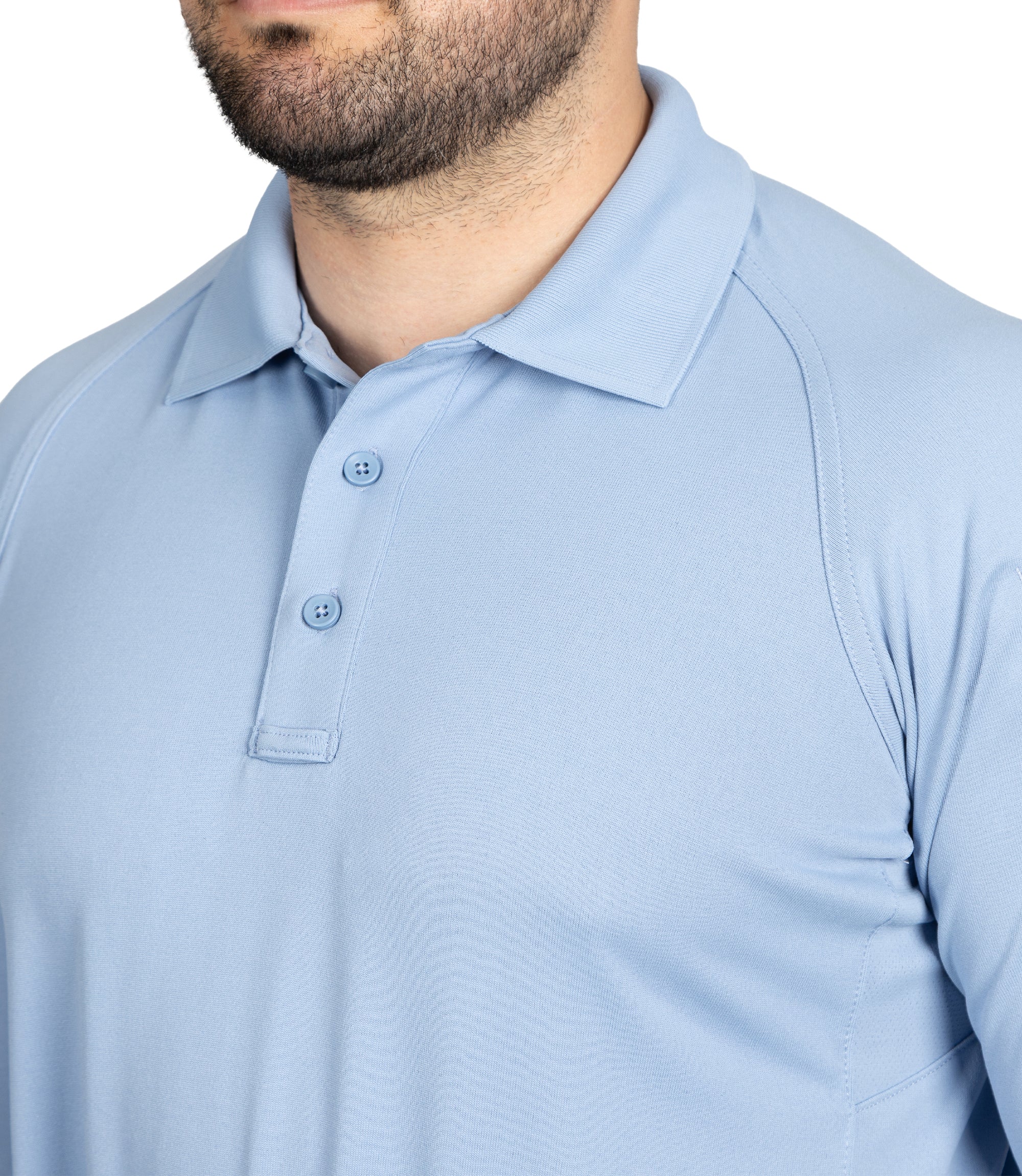 Closeup button of Men's Performance Long Sleeve Polo in Medium Blue |color_medium blue