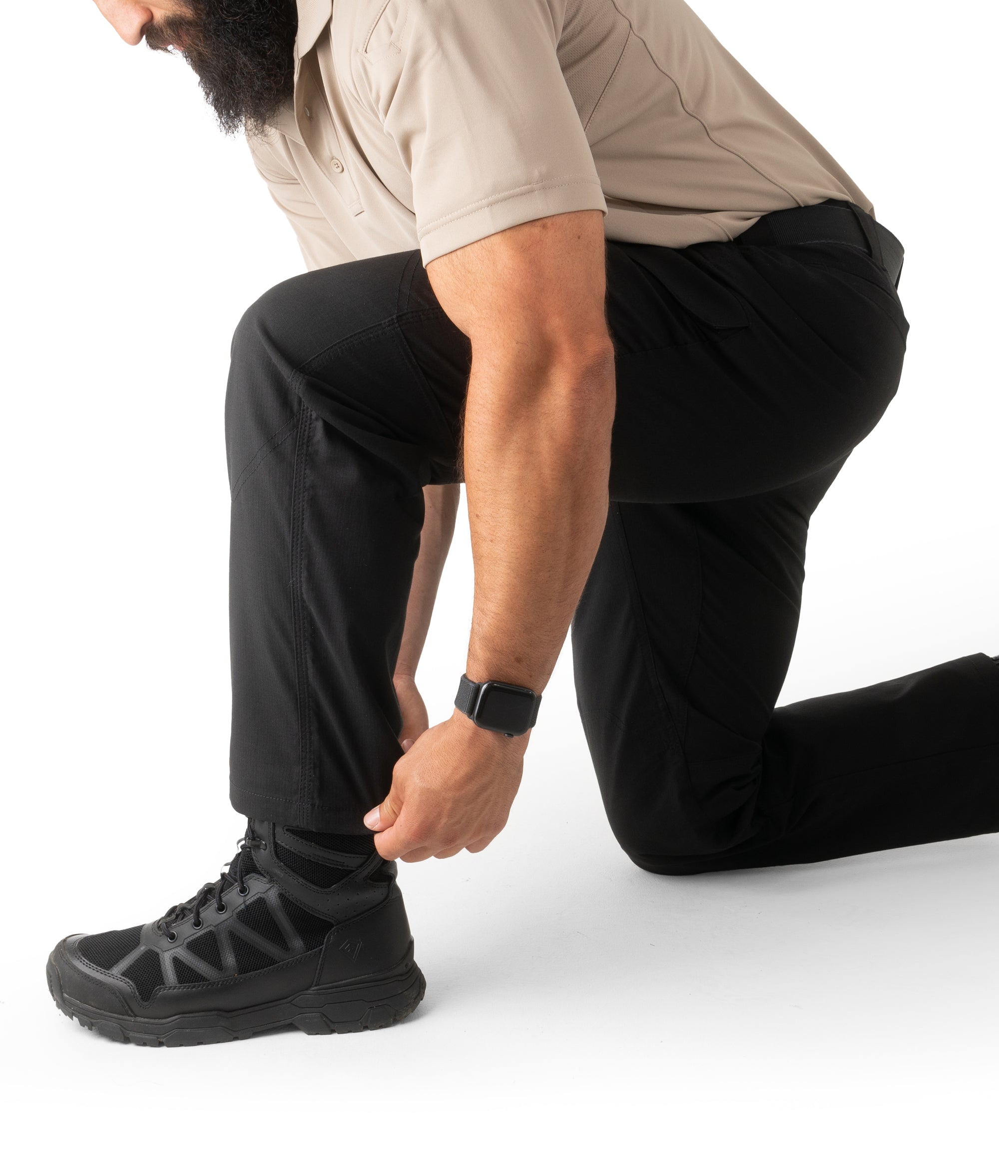 Man kneeling in Mens V2 Tactical Pants in Black |color_black
