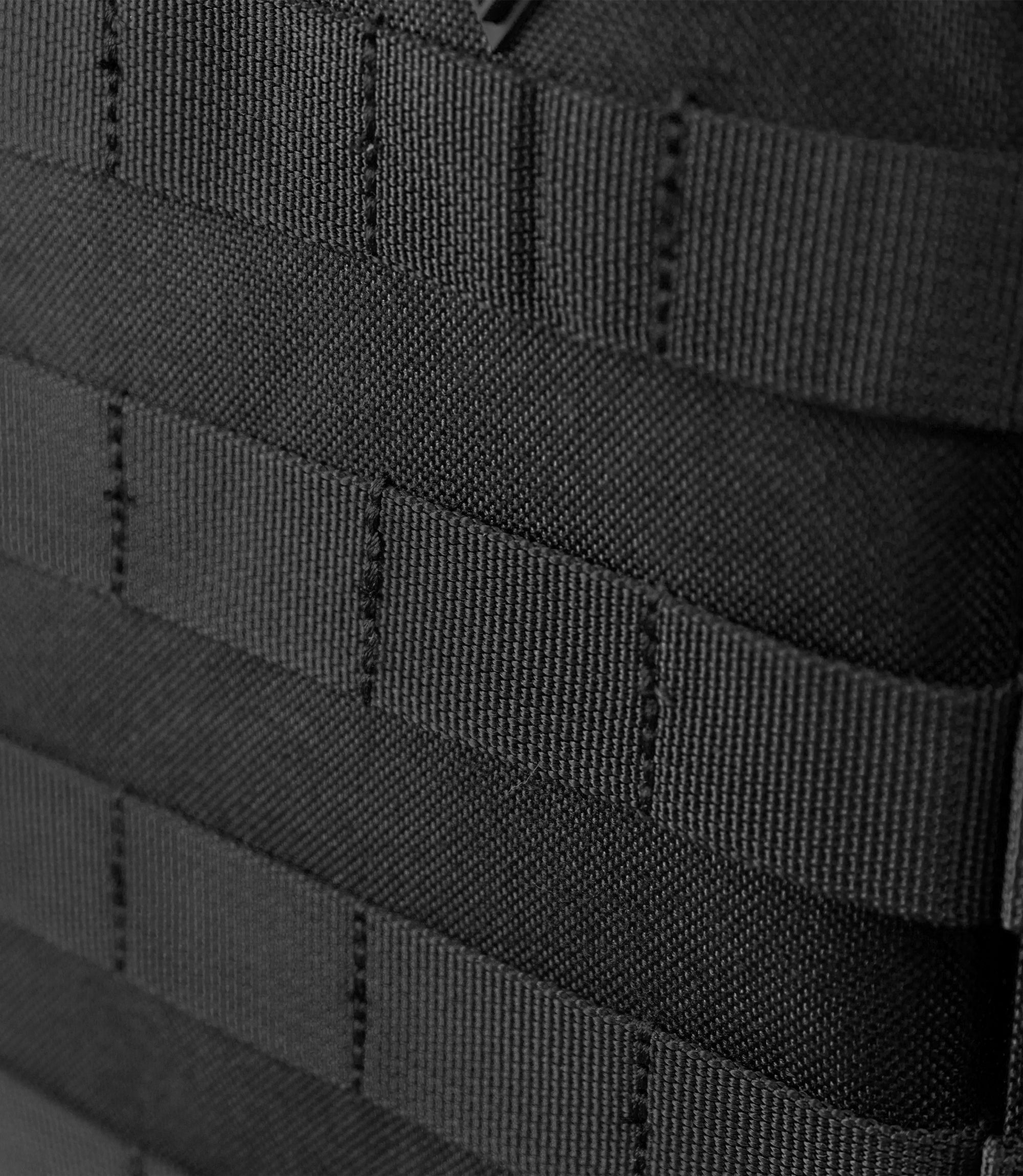 Closeup MOLLE view of Specialist Plate Rack in black |color_black
