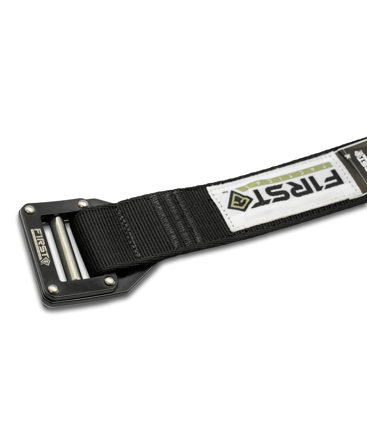 Backside shot of then black nylon tactical belt with a black metal buckle, featuring a white brand patch with 'FIRST' and a green diamond logo, shown on a white background |color_black