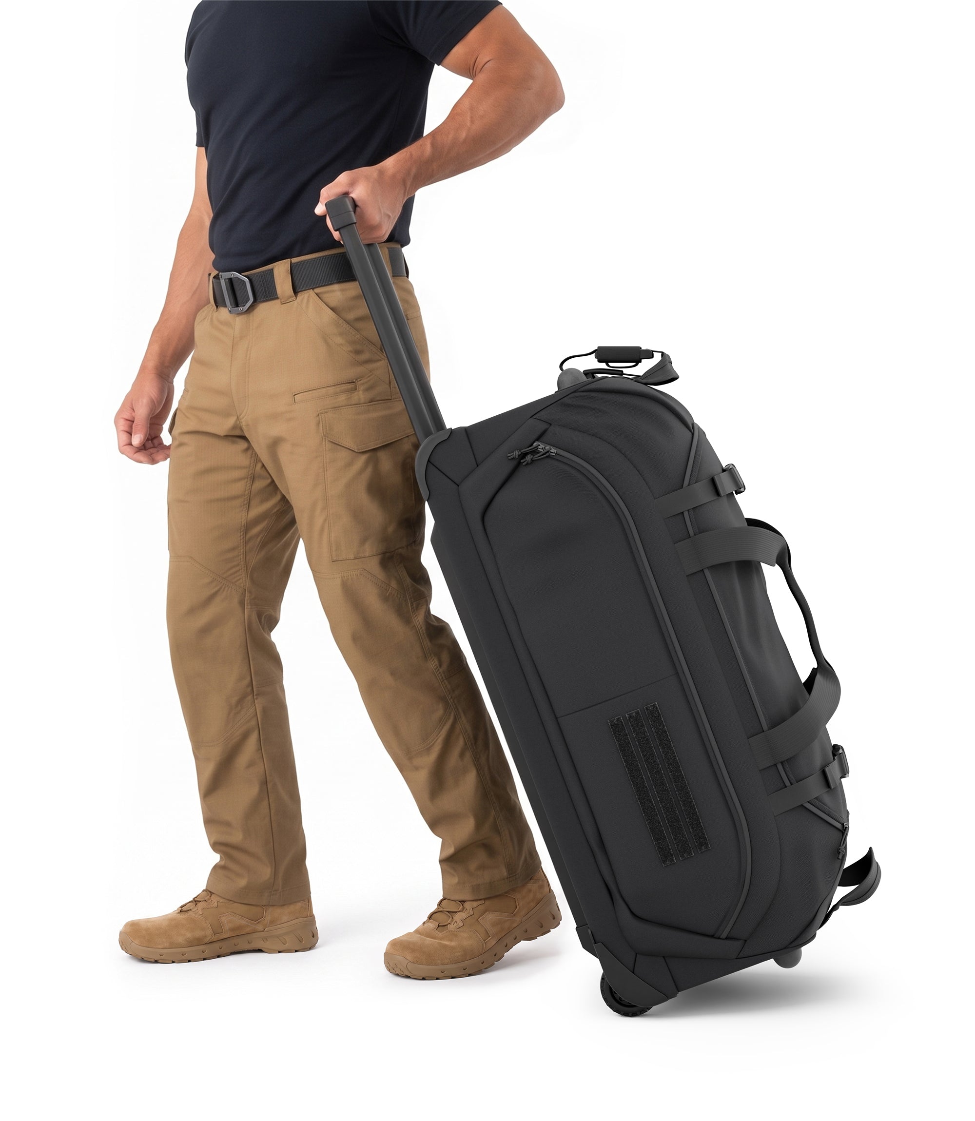 Person rolling black Specialist Rolling Duffle using the extended telescoping handle |color_black