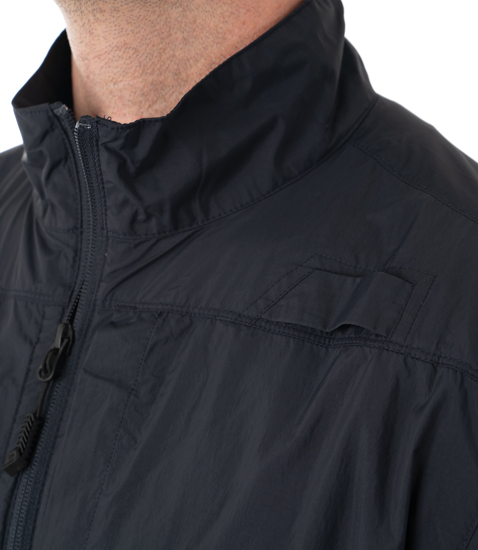 Closeup Loop of Men's Pack-It Jacket in Midnight Navy |color_midnight navy