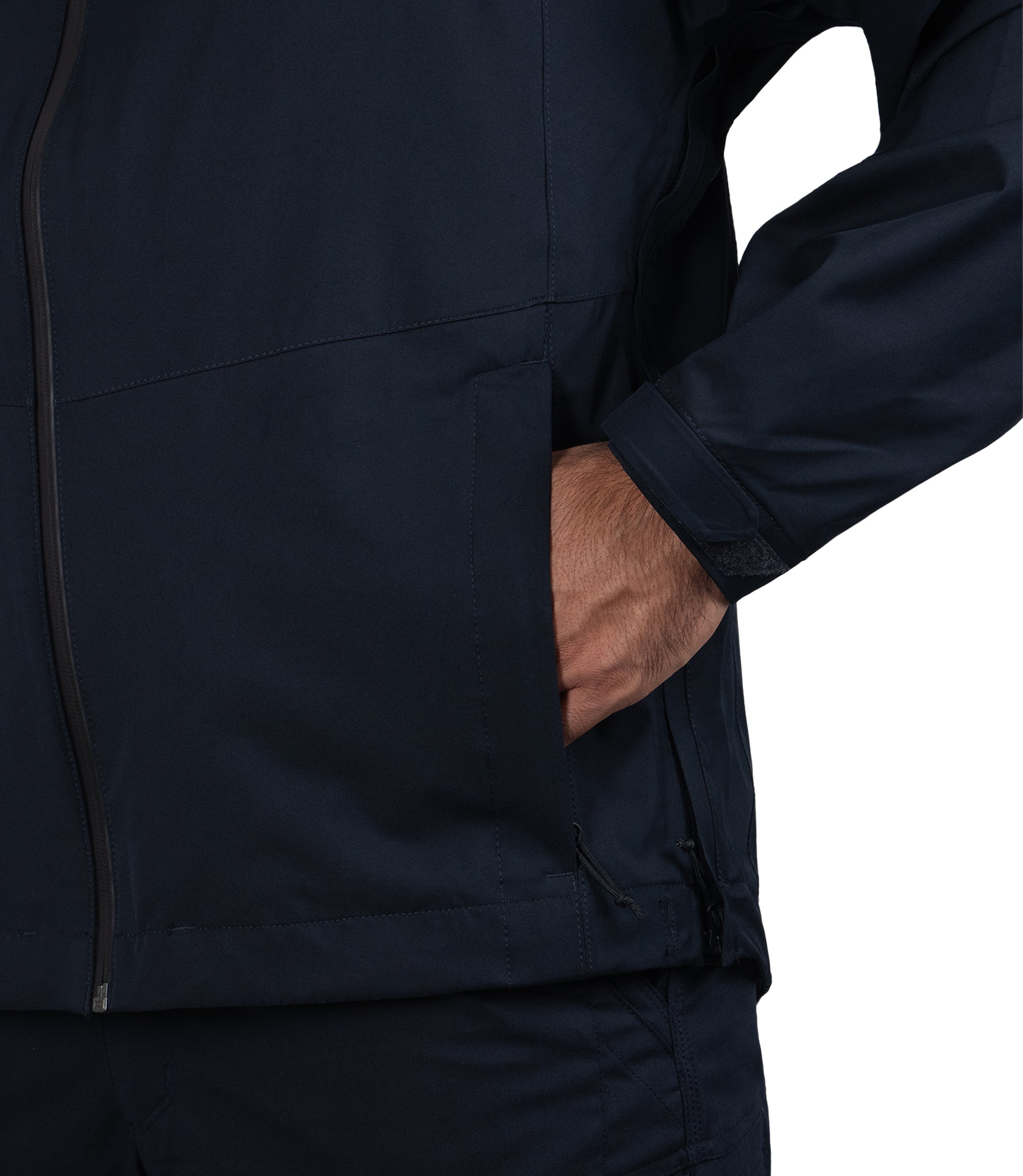 Vertical hand pockets with zipper closure view of the Monsoon Parka in color Midnight Navy |color_midnight navy