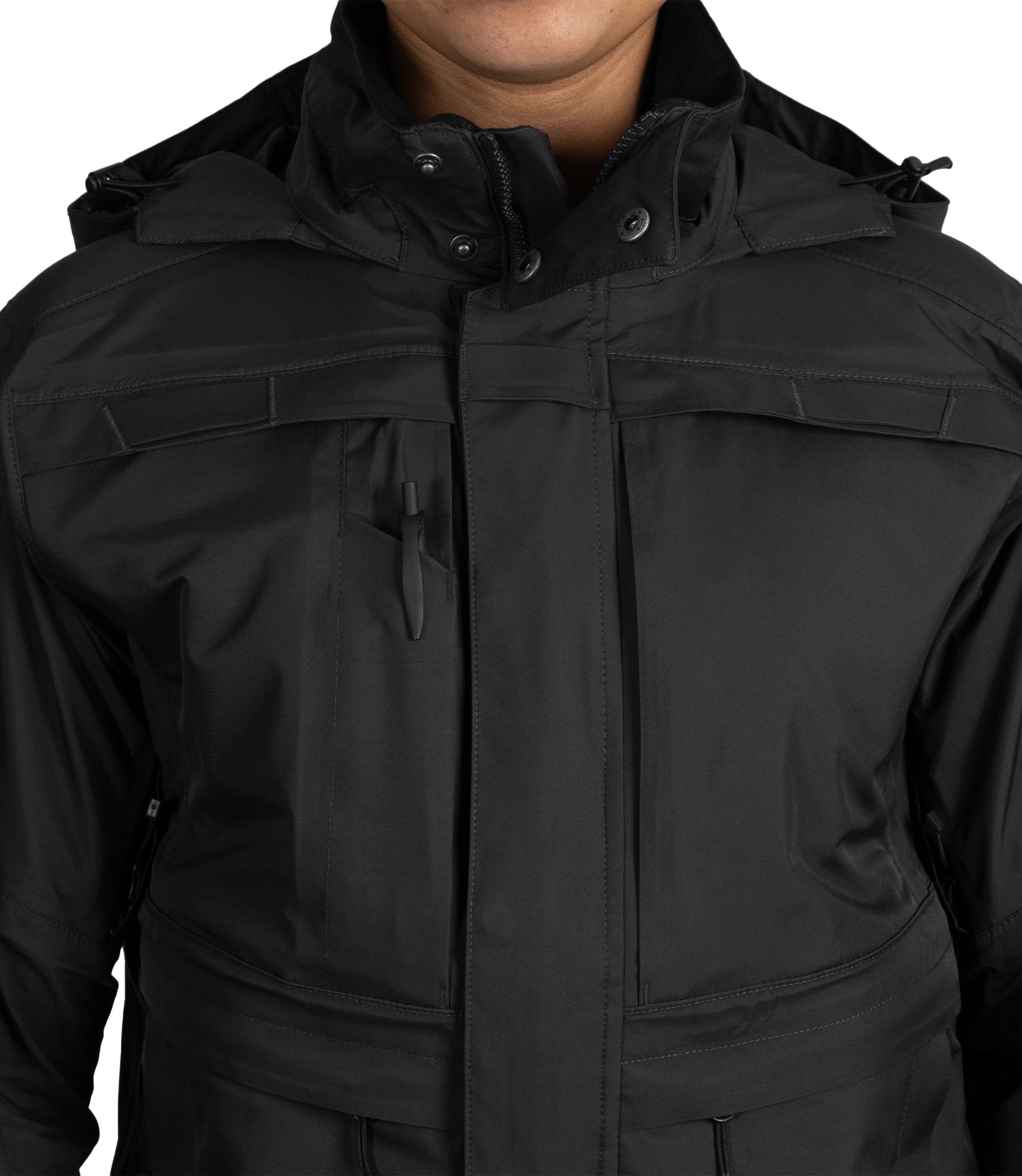 Close up view of mic loop and pen holder pocket of Women’s Tactix Parka Shell Black|color_black