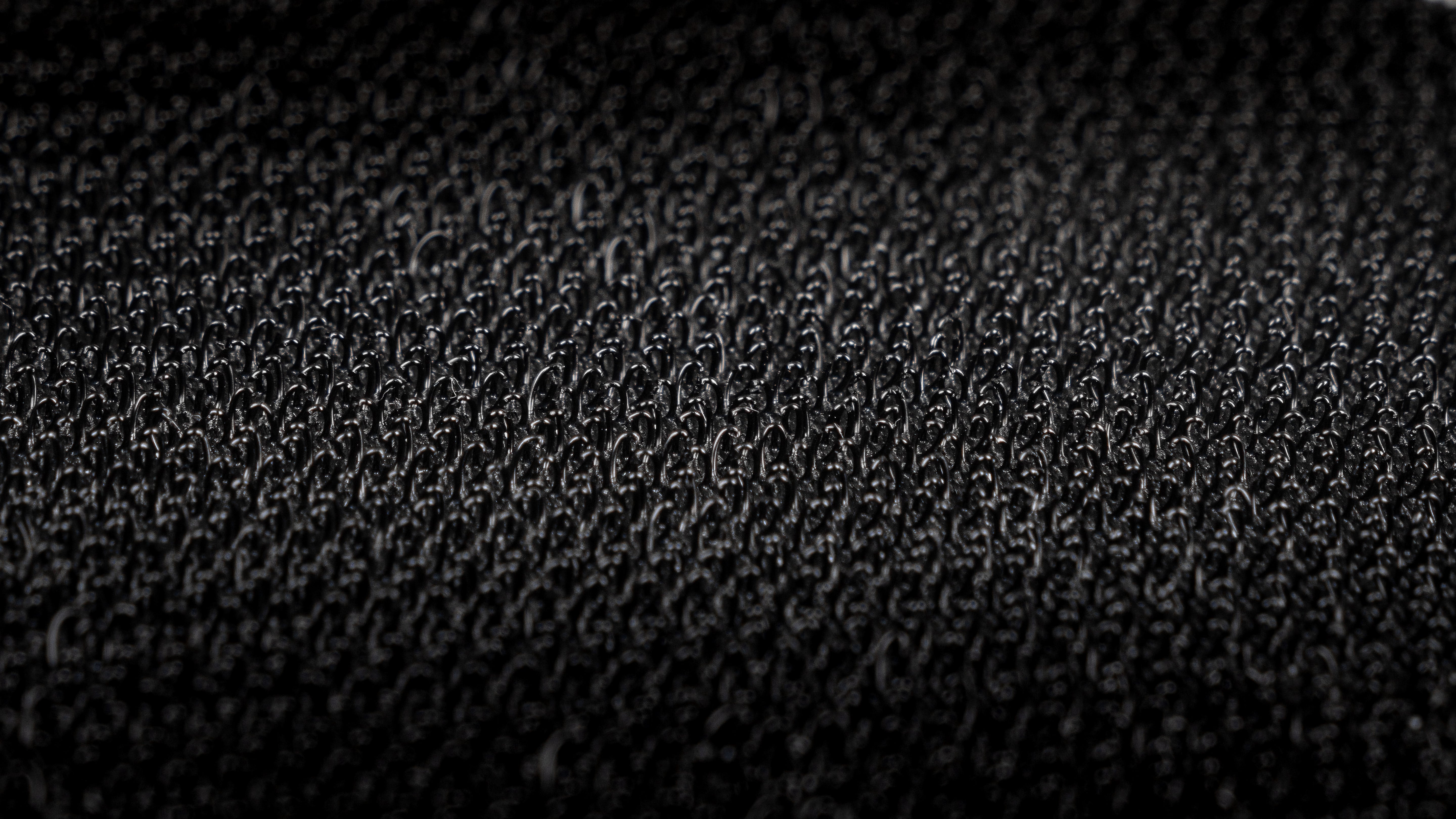 Close up of heat-bonded hook and loop backing
